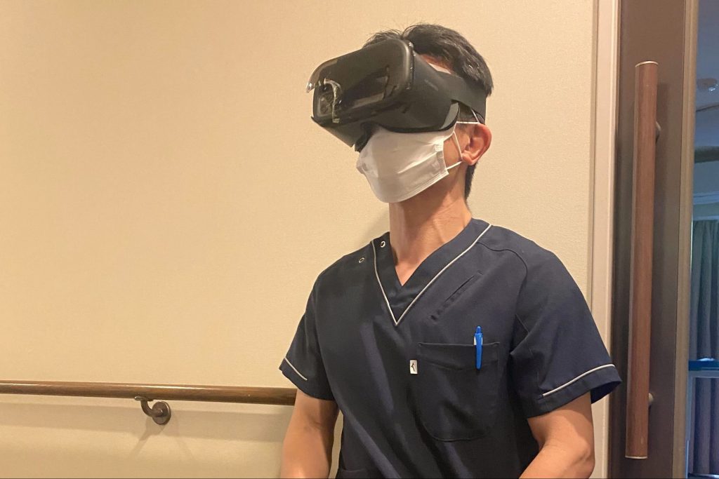 A man wearing an AR headset over his eyes