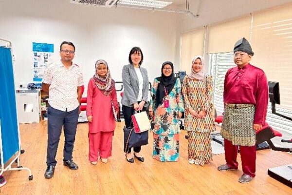 With Dr. Mohd Nazim Mohtar, Head of Laboratory (far right), Prof. Siti Anom Ahmad (third from right), and the members of MyAgeing™ at the Physical Functionality Lab