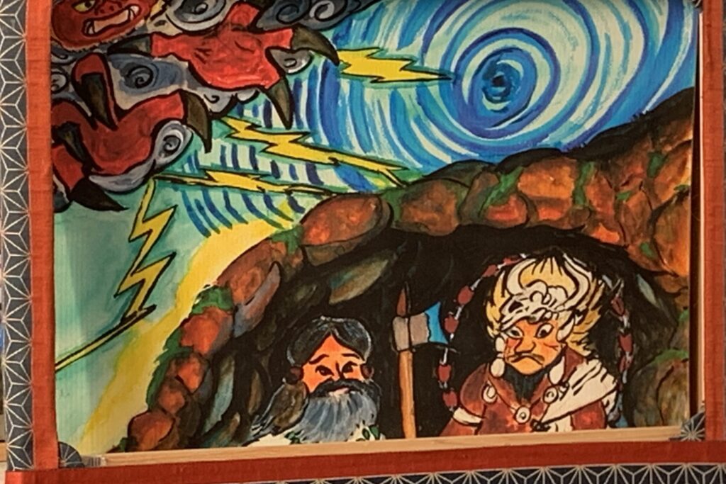 The vibrant images of the paper theater capture the children's imagination