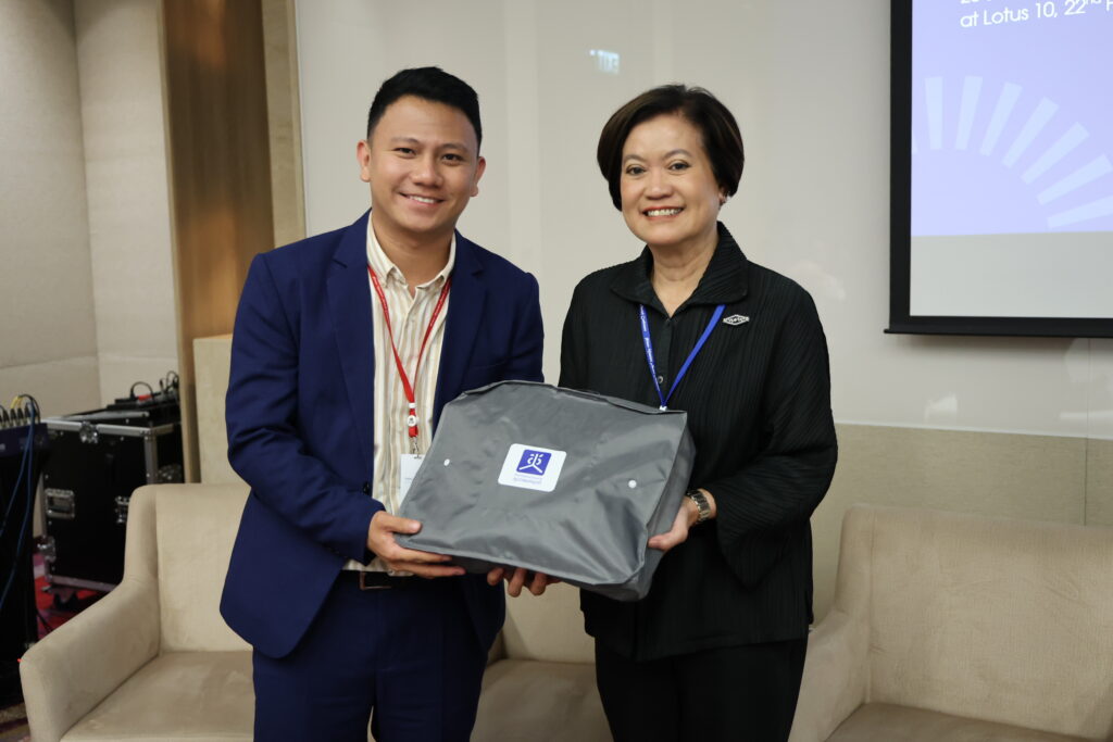 Mr. Edren M. Llanillo recieves a thank you for speaking at the event